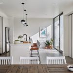 Contemporary kitchen and dining area in a modern residential home.